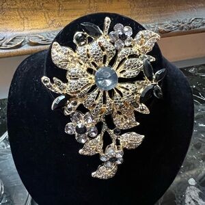 Elegant Gold and Silver Floral Brooch